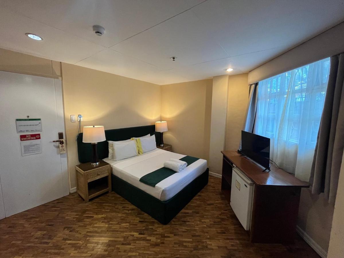 Coco Grande Hotel Dumaguete City Buitenkant foto